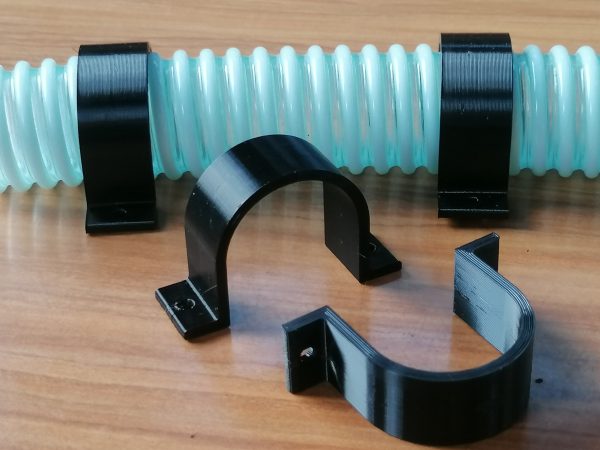 4 x 32mm Vardo Systems hose clips on a table