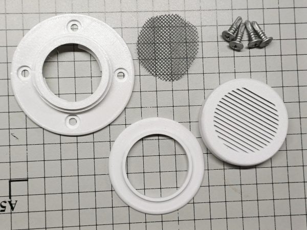 Vardo Systems White Grill Air Vent disassembled on a table showing scale and fittings included